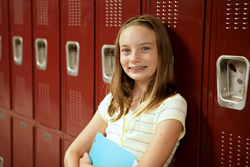 photo of girl by school lockers